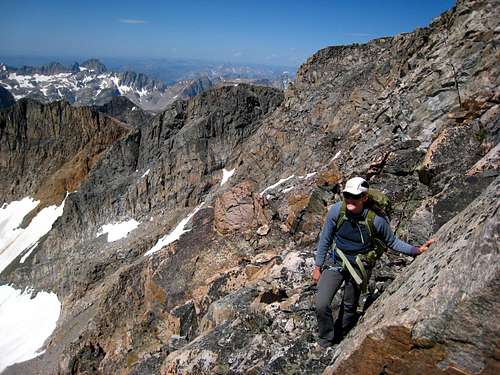 Crossing the ledges on the granite Traverse